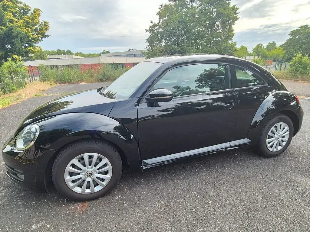 Gebraucht VW Beetle Comfortline 105 PS (77 kW) 2012 Schwarz Kleinwagen