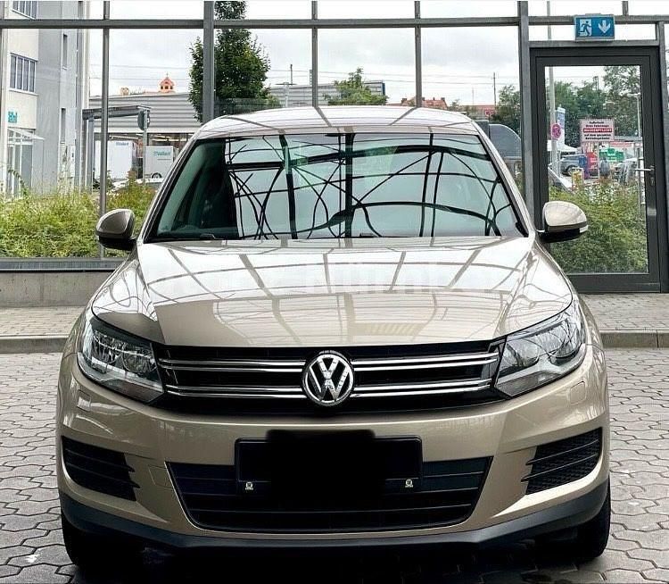 Beige Gebraucht 2014 VW Tiguan Trendline SUV | 8.499 € (Superpreis) - Bild 1/4