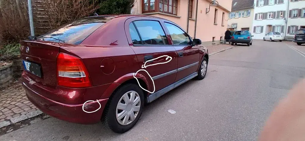Używany Opel Astra 101 KM (74 kW) 2000 Czerwony Sedan/Limuzyna