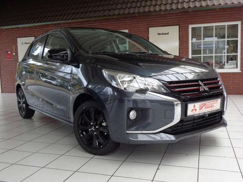 Titan weiss/piano schwarz (d) Neu 2025 Mitsubishi Space Star Select+ Kleinwagen | 16.900 € - Bild 1/4