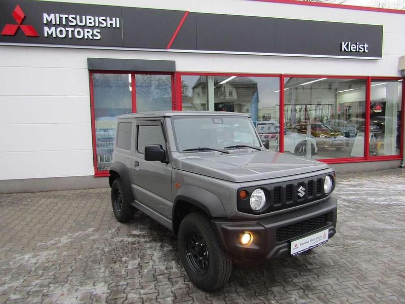 Gebraucht Suzuki Jimny Comfort 102 PS (75 kW) 2023 Medium gray SUV