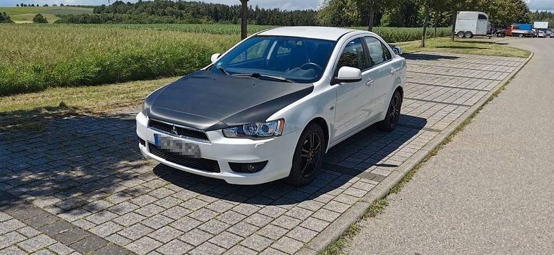 Weiß Gebraucht 2011 Mitsubishi Lancer Limousine | 6.200 € - Bild 1/4