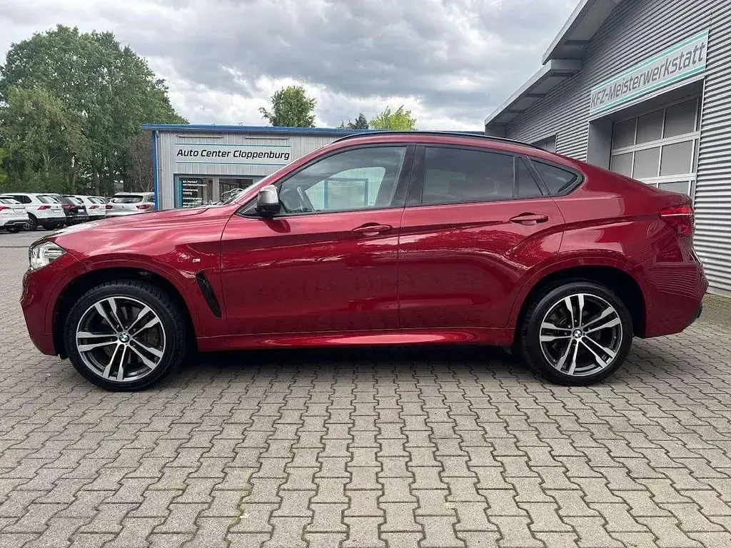 Gebraucht BMW X6 M50 Performance 381 PS (280 kW) 2016 Flamencorot brillant SUV