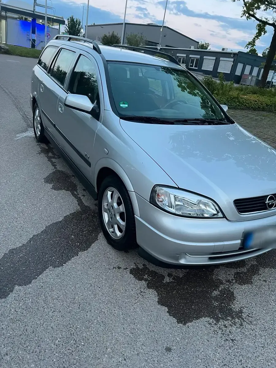 Używany Opel Astra 101 KM (74 kW) 2003 Srebrny Kombi