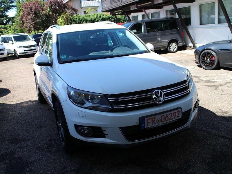 Weiss iii Gebraucht 2014 VW Tiguan Cup SUV | 9.900 € (Superpreis) - Bild 1/4