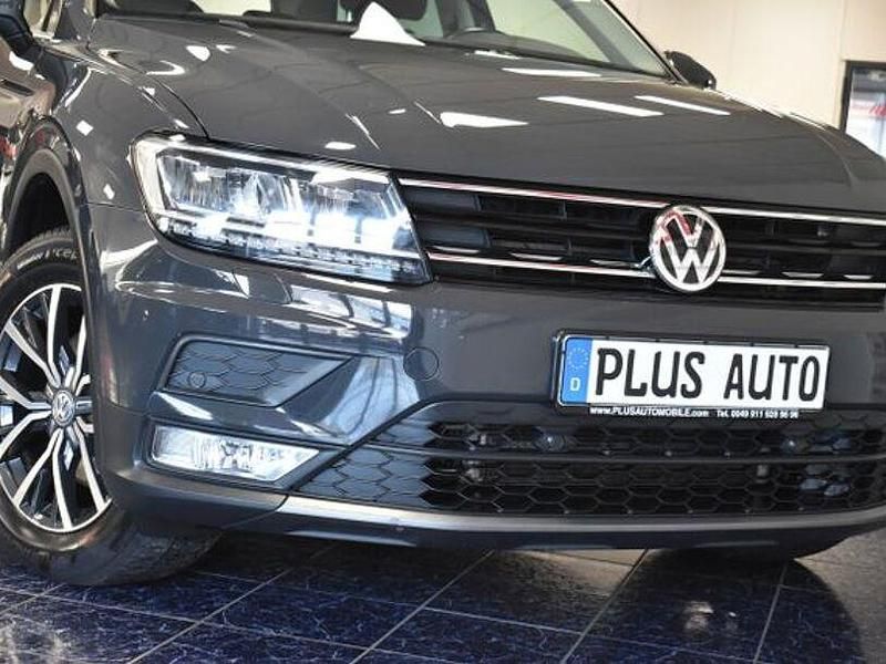 Uranograu Gebraucht 2017 VW Tiguan Comfortline SUV | 19.670 € (Fairer Preis) - Bild 1/4