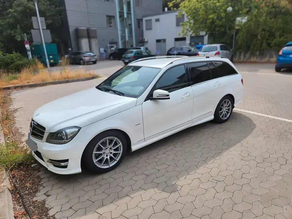 Gebraucht Mercedes C200 AMG line 136 PS (100 kW) 2013 Weiß Kombi