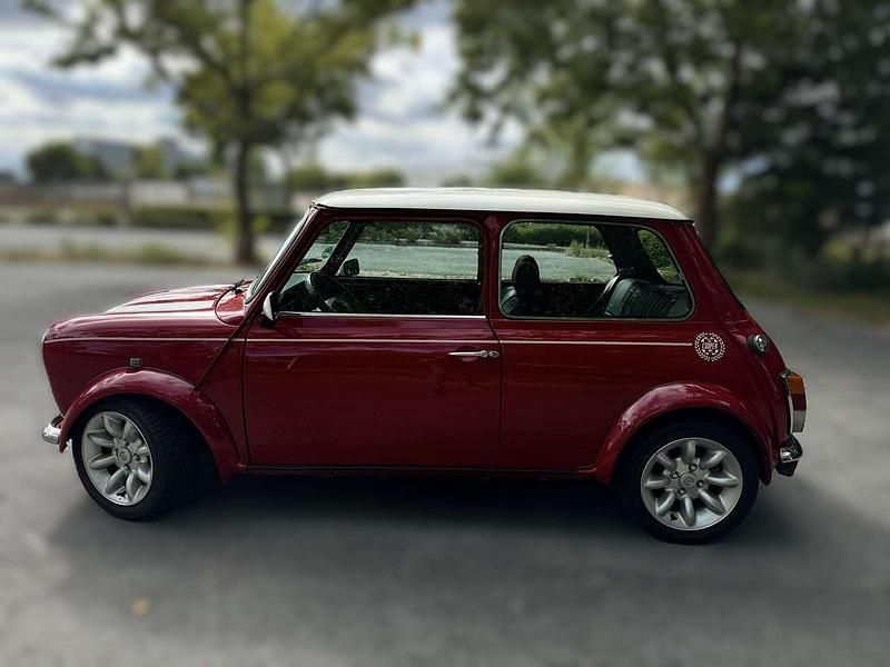 Second-hand Rover Mini 63 CP (46 kW) 2000 Roșu Coupe