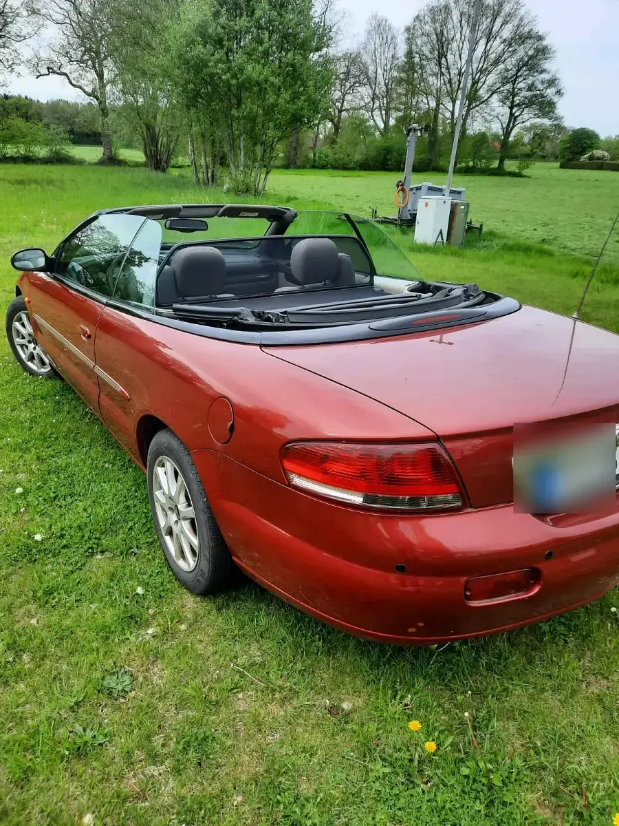Second-hand Chrysler Sebring Cabriolet 206 CP (151 kW) 2006 Roșu Cabrio