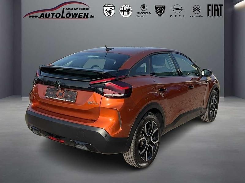 Gebraucht Citroën e-C4 Feel 100 kW (136 PS) 2022 Lackierung pulsorange/typ aus Limousine