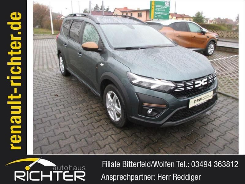 Grün Gebraucht 2023 Dacia Jogger Extreme Van / Kleinbus | 23.995 € (Fairer Preis) - Bild 1/4