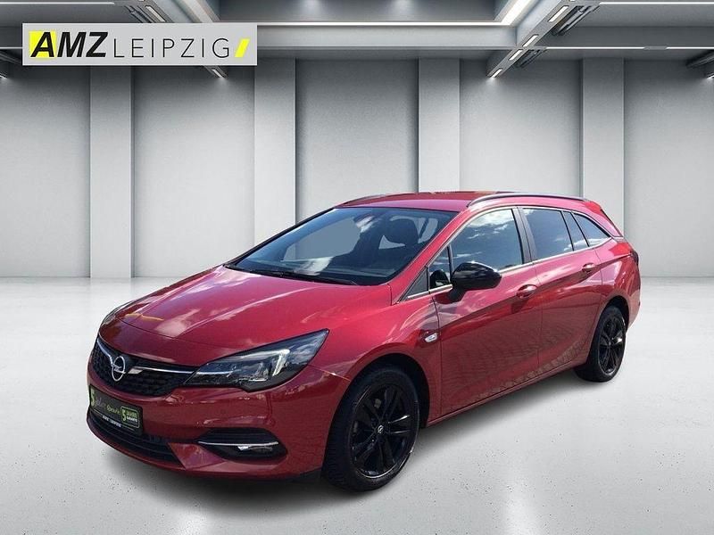 Chili rot/kardio rot Gebraucht 2021 Opel Astra Edition Kombi | 16.895 € (Fairer Preis) - Bild 1/4