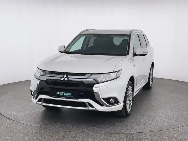 Dynamik rot (d) Gebraucht 2021 Mitsubishi Outlander P-HEV SUV | 23.789 € (Fairer Preis) - Bild 1/4