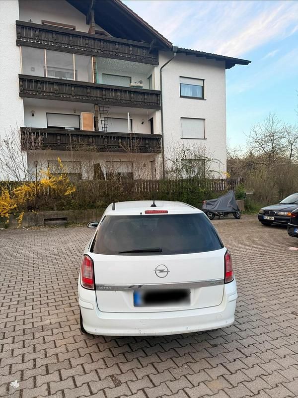 Second-hand Opel Astra 110 CP (80 kW) 2010 Alb Break