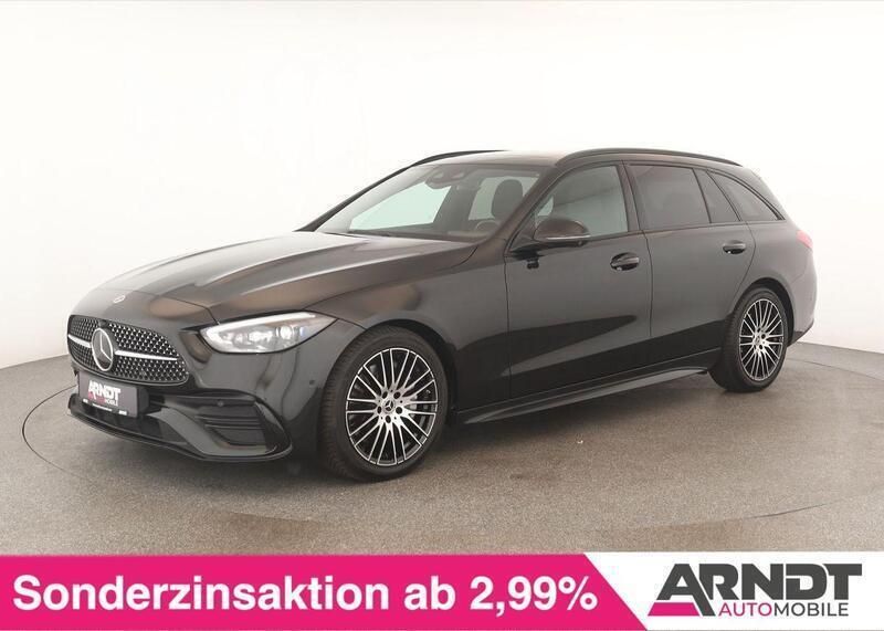 Obsidianschwarz Gebraucht 2023 Mercedes C200 AMG Limousine | 45.484 € - Bild 1/4