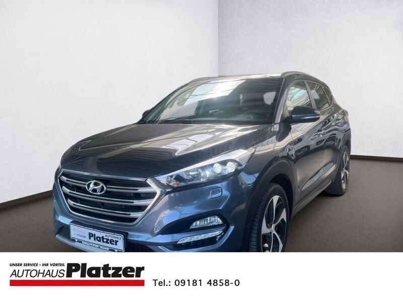 Grau Gebraucht 2017 Hyundai Tucson Premium SUV | 16.980 € (Fairer Preis) - Bild 1/4