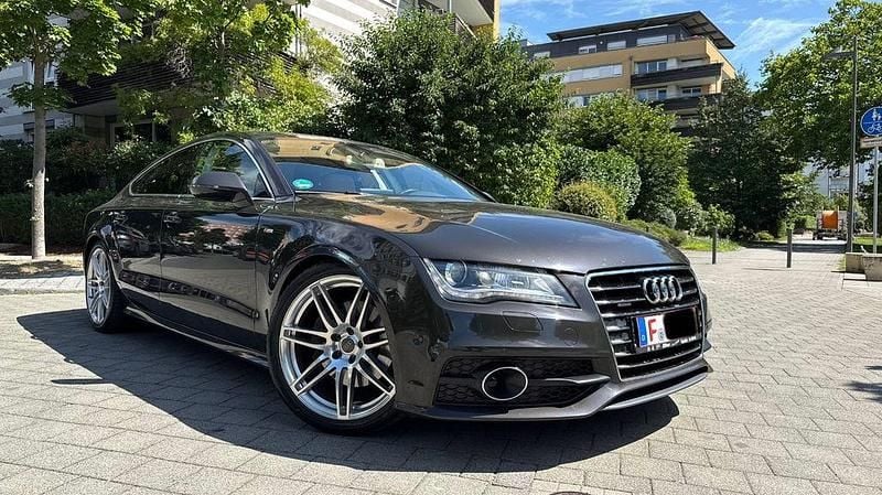 Grau Gebraucht 2011 Audi A7 Sportback Exclusive Kleinwagen | 12.790 € - Bild 1/4