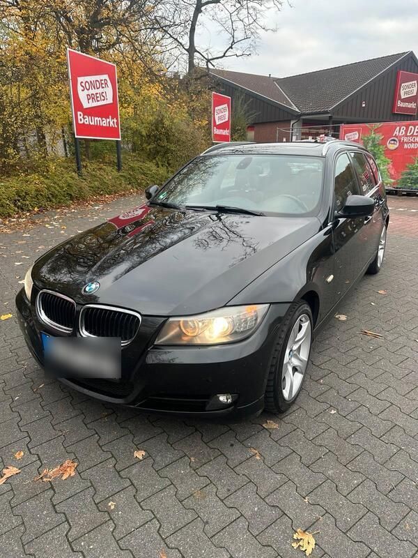 Schwarz Gebraucht 2011 BMW 330 Comfort Edition Kombi | 9.390 € - Bild 1/4