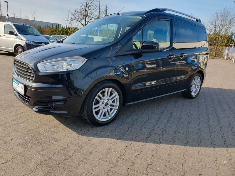 Schwarz Gebraucht 2014 Ford Tourneo Courier Titanium Van / Kleinbus | 8.999 € (Fairer Preis) - Bild 1/4