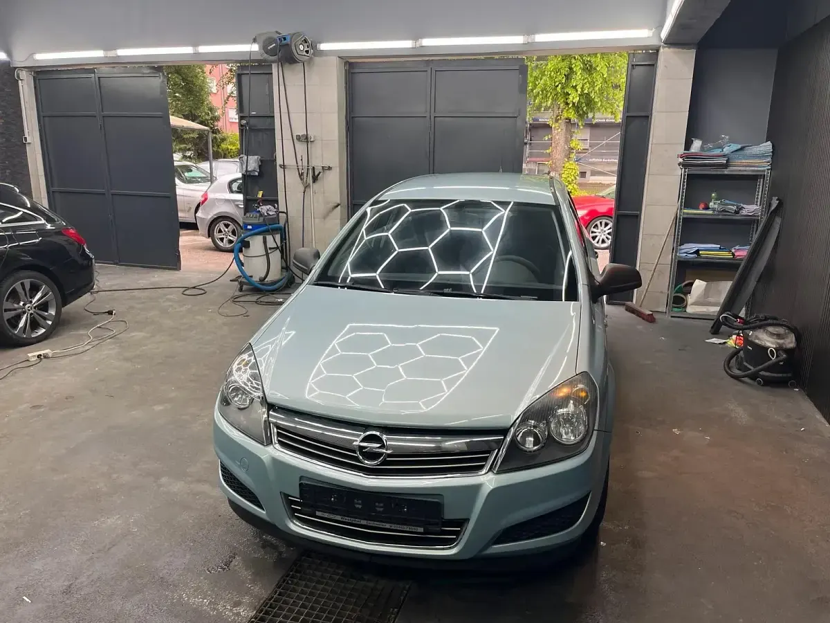 Używany Opel Astra 90 KM (66 kW) 2009 Niebieski Kombi