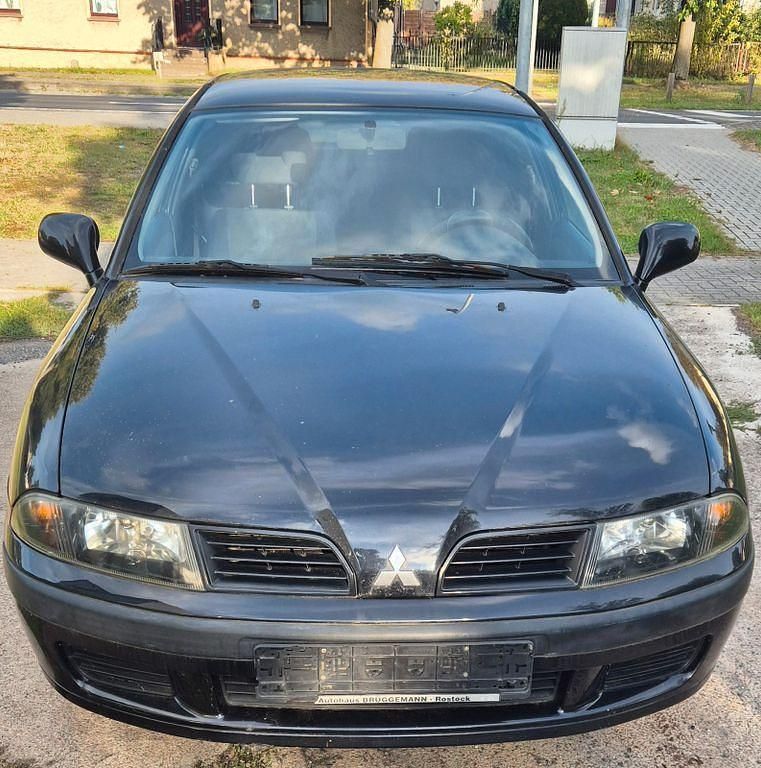 Gebraucht Mitsubishi Carisma 103 PS (75 kW) 2003 Schwarz Limousine
