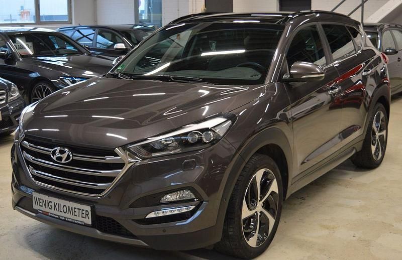 Grau Gebraucht 2016 Hyundai Tucson Premium SUV | 19.800 € (Etwas zu teuer) - Bild 1/4