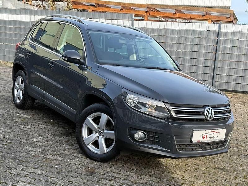 Grau Gebraucht 2014 VW Tiguan Sportline SUV | 14.900 € (Fairer Preis) - Bild 1/4