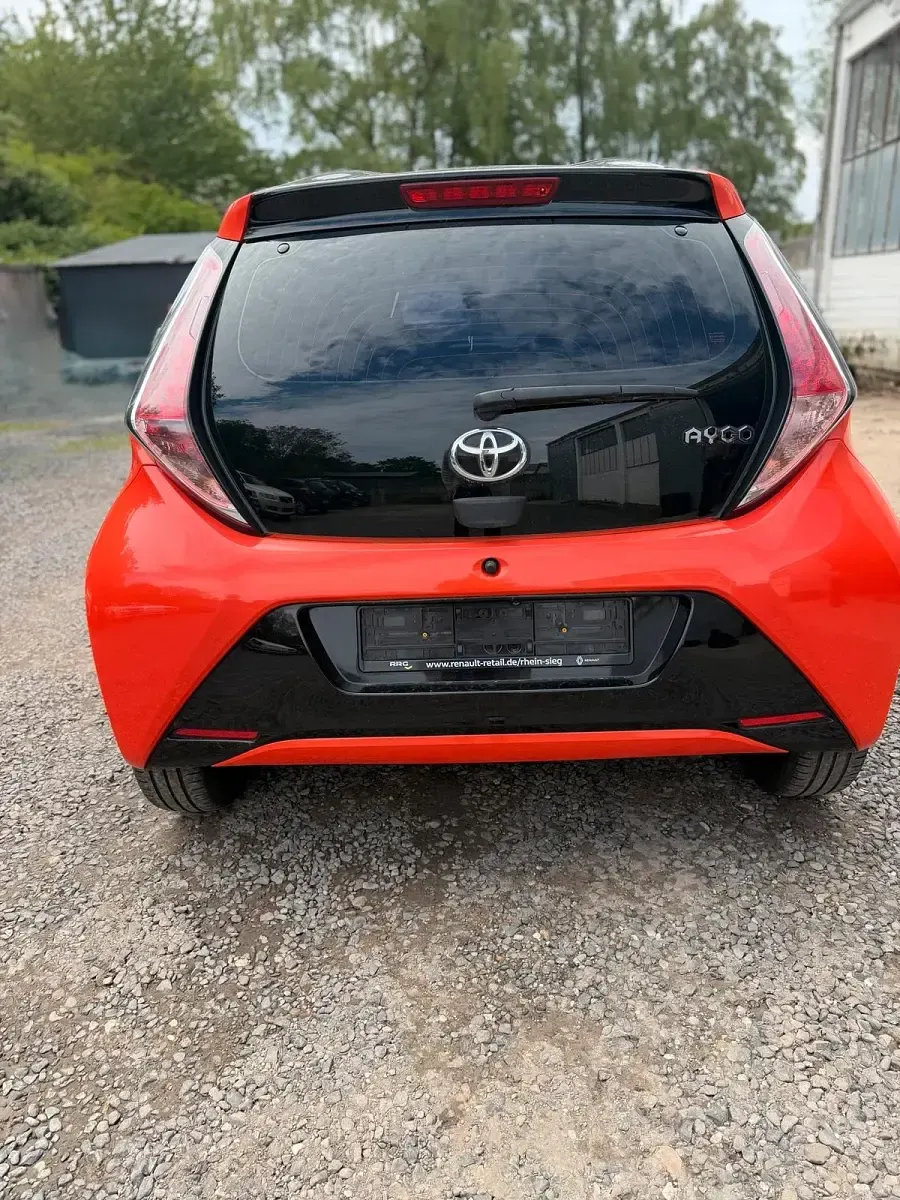 Gebraucht Toyota Aygo 70 PS (51 kW) 2014 Orange Kleinwagen