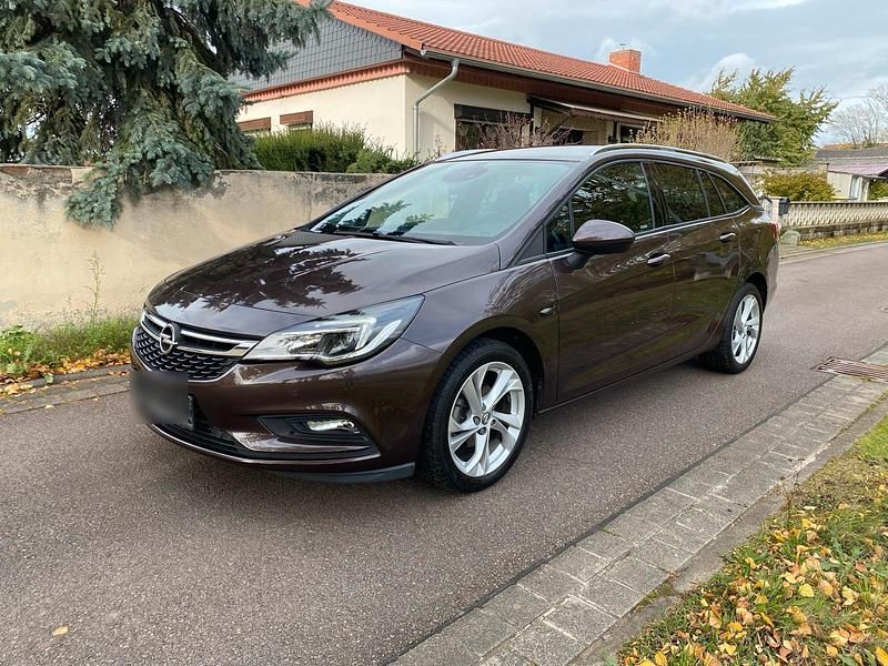 Braun Gebraucht 2018 Opel Astra Kombi | 8.999 € (Superpreis) - Bild 1/4