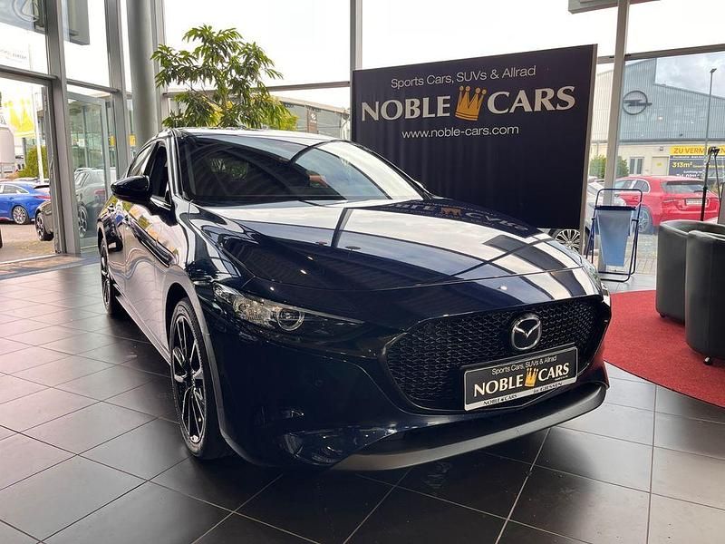 Deep crystal blue (metallic) Gebraucht 2023 Mazda 3 Homura-Line Limousine | 24.990 € (Fairer Preis) - Bild 1/4