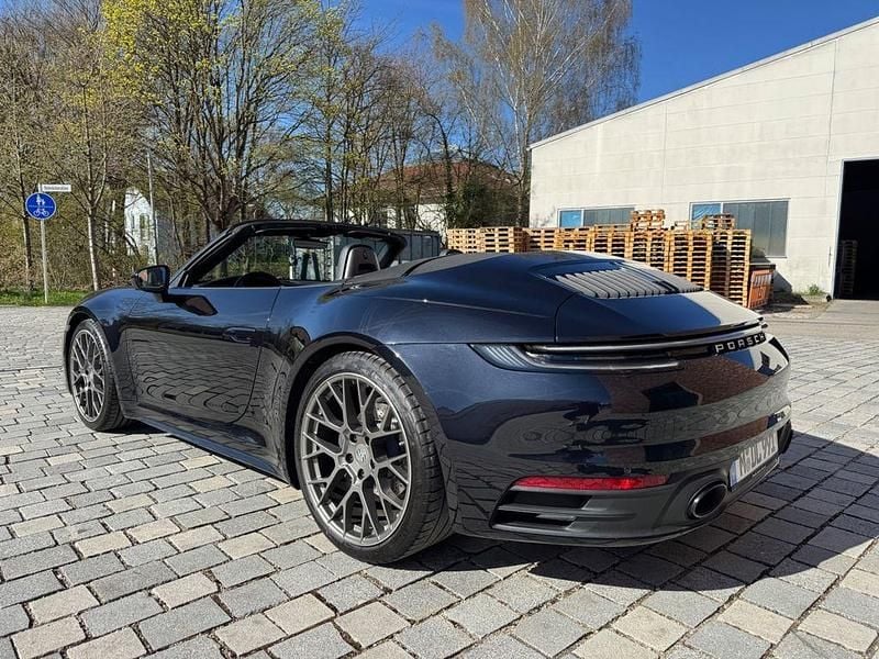 Gebraucht Porsche 992 385 PS (283 kW) 2024 Schwarz Cabrio