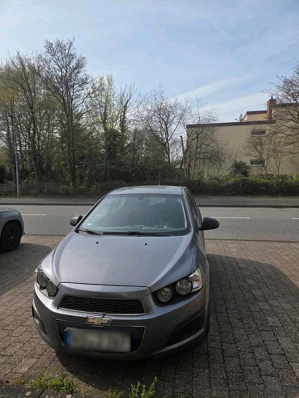 Gebraucht Chevrolet Aveo 86 PS (63 kW) 2012 Grau Kleinwagen