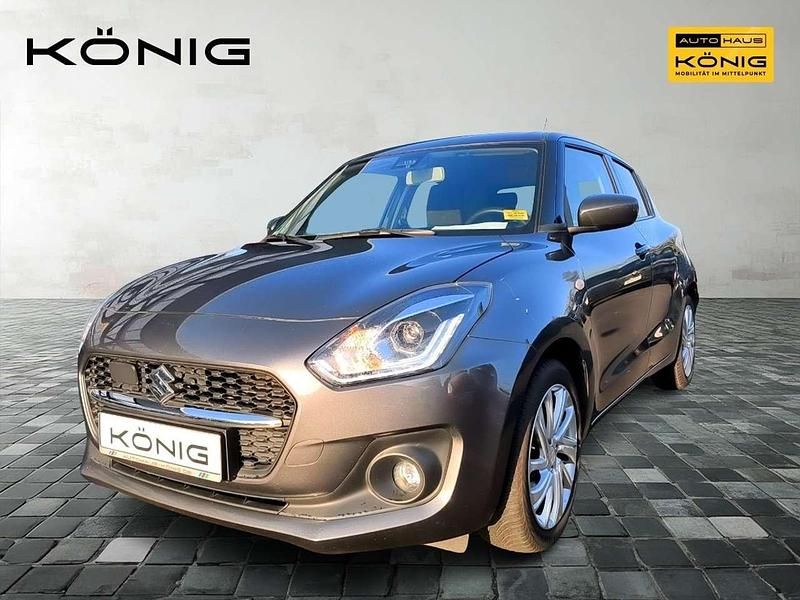 Grau Gebraucht 2023 Suzuki Swift Comfort Limousine | 16.990 € (Teuer) - Bild 1/4