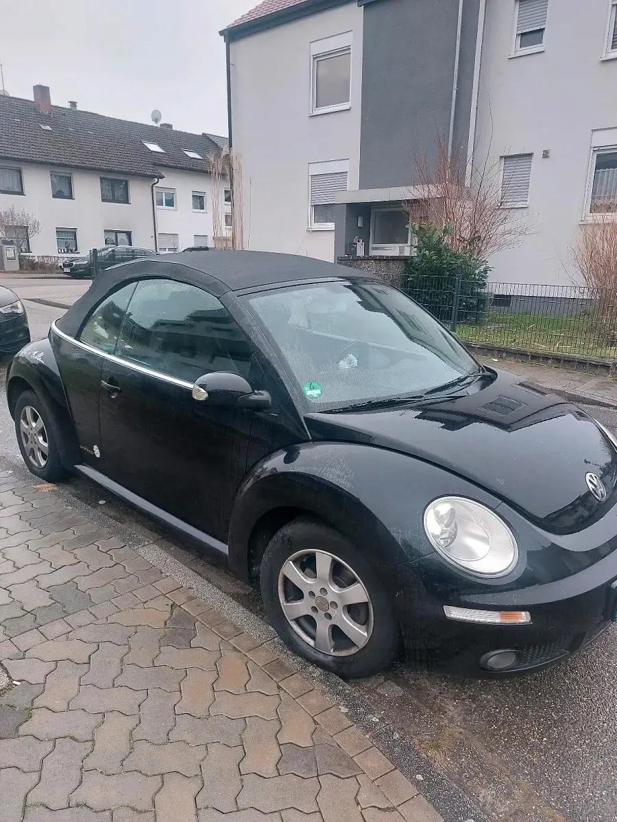 Gebraucht VW New Beetle 75 PS (55 kW) 2009 Schwarz Kleinwagen
