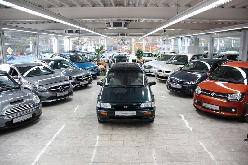 Second-hand Kia Pride 64 CP (47 kW) 2000 Verde Berlinǎ