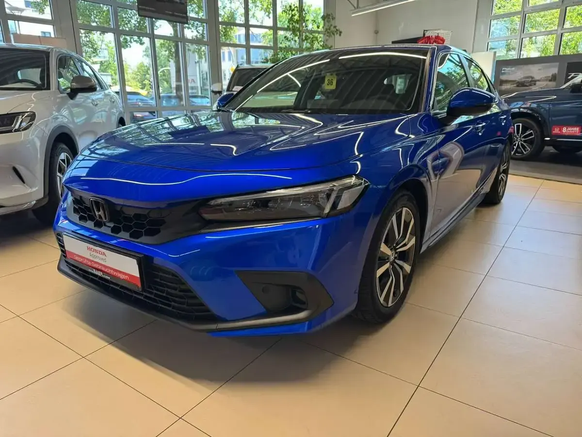 Gebraucht Honda Civic Elegance 184 PS (135 kW) 2024 Prem crystal blue m Limousine