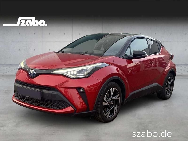 Emotional red 2 (3u5)/ black ( Gebraucht 2022 Toyota C-HR+ Team SUV | 22.950 € (Guter Preis) - Bild 1/3