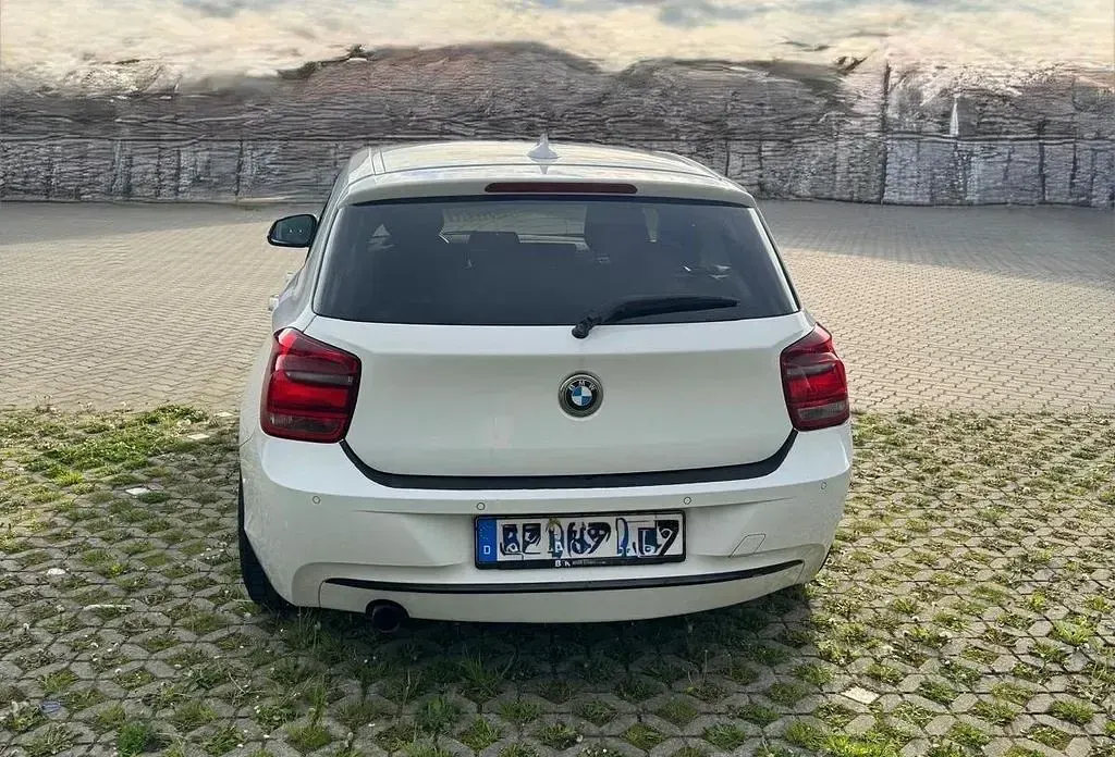 Używany BMW 118 Performance 170 KM (125 kW) 2012 Biały Hatchback