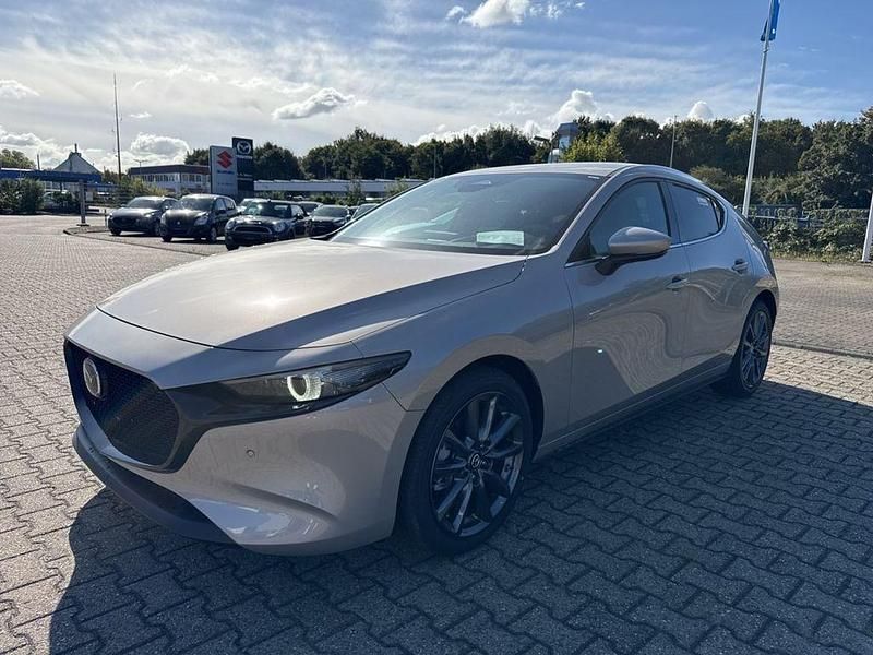 Beige Neu 2025 Mazda 3 Exclusive-Line Limousine | 28.990 € - Bild 1/4