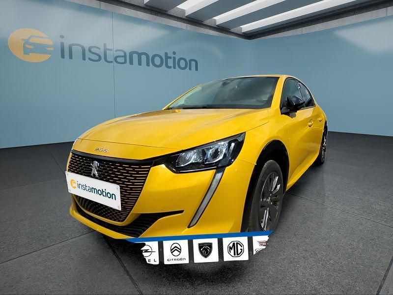 Gelb Gebraucht 2023 Peugeot e-208 Kleinwagen | 18.499 € (Guter Preis) - Bild 1/4