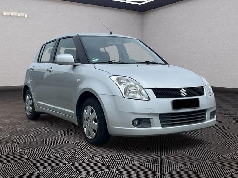 Grau Gebraucht 2007 Suzuki Swift Comfort Limousine | 2.890 € (Fairer Preis) - Bild 1/4