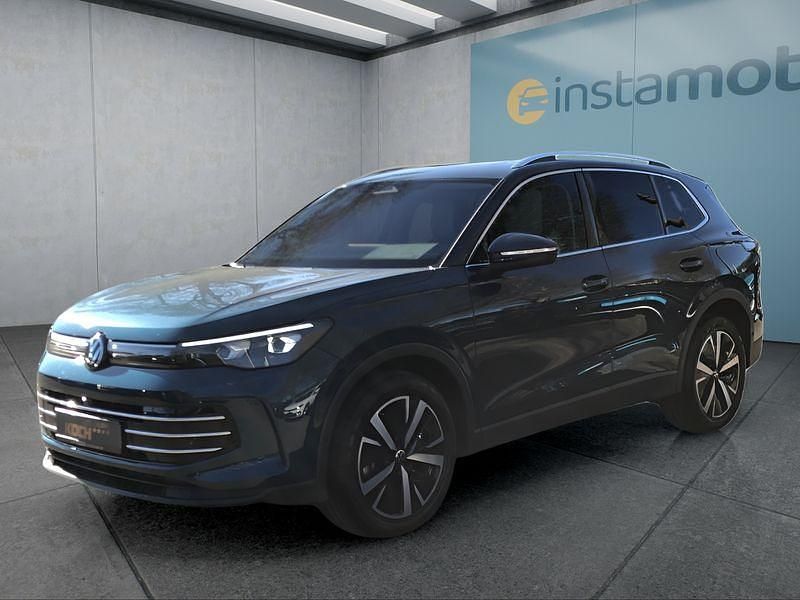 Blau Gebraucht 2024 VW Tiguan SUV | 42.099 € (Teuer) - Bild 1/4