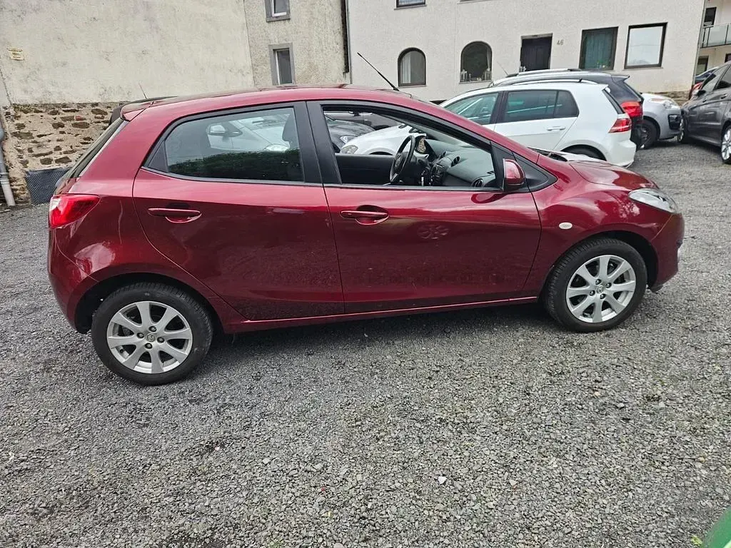 Gebraucht Mazda 2 Active 75 PS (55 kW) 2011 Rot Kleinwagen