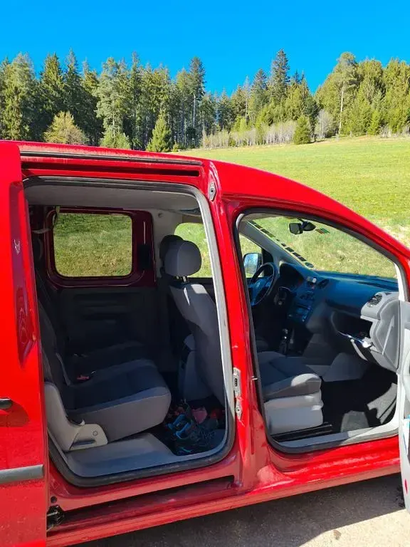 Gebraucht VW Caddy Team 105 PS (77 kW) 2010 Rot Van / Kleinbus