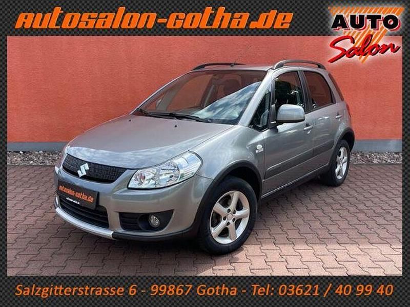 Grau Gebraucht 2009 Suzuki SX4 Comfort SUV | 6.990 € (Etwas zu teuer) - Bild 1/4