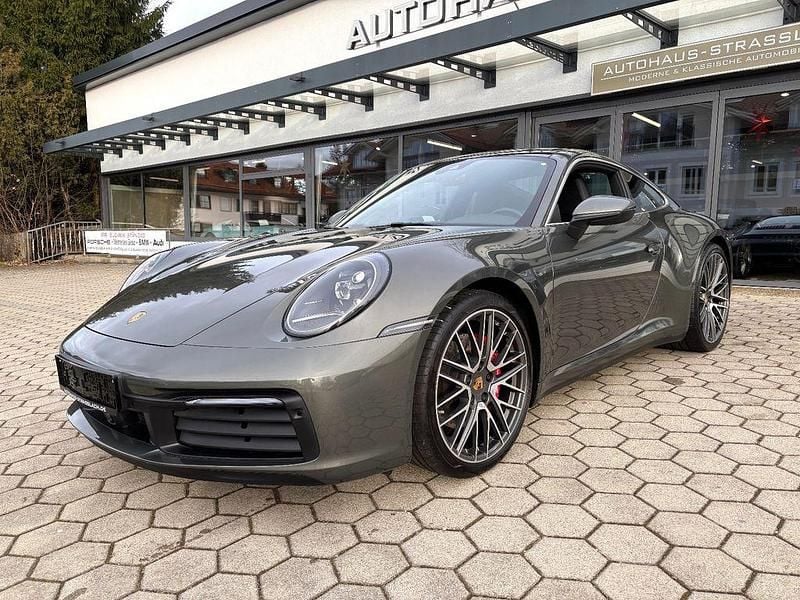 Aventuringrünmetallic Gebraucht 2021 Porsche 911 Carrera S Chrono Coupé | 129.900 € (Fairer Preis) - Bild 1/4