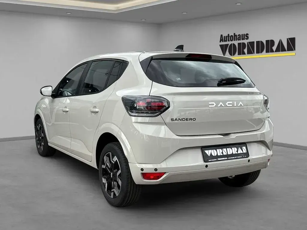Neu Dacia Sandero Journey 101 PS (74 kW) 2025 Sandstone metallic Limousine