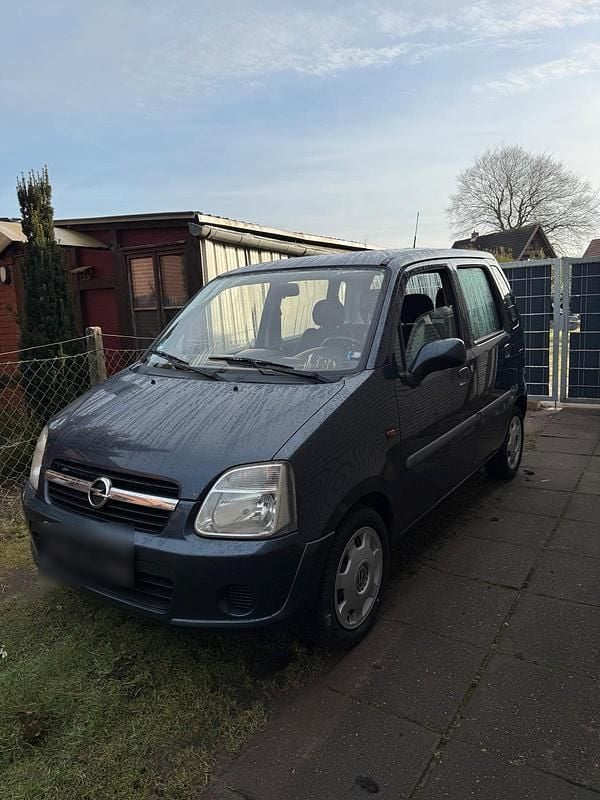 Używany Opel Agila 60 KM (44 kW) 2006 Niebieski Hatchback