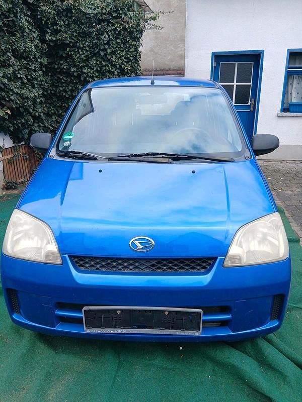 Gebraucht Daihatsu Cuore 60 PS (44 kW) 2003 Blau Kleinwagen