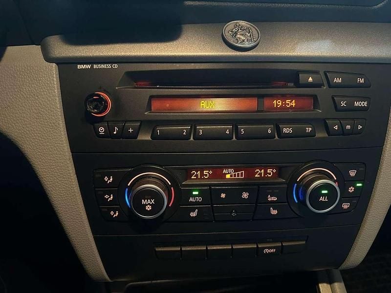 Gebraucht BMW 116 122 PS (89 kW) 2009 Schwarz Kleinwagen